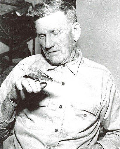 John William Conner with his Parakeet